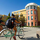 "student riding a bike near tercero commons uc davis"