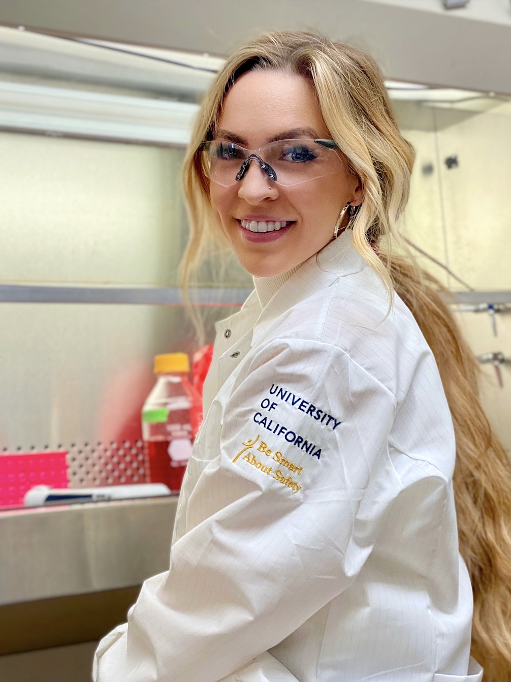 Erin Doherty smiling in the lab. 